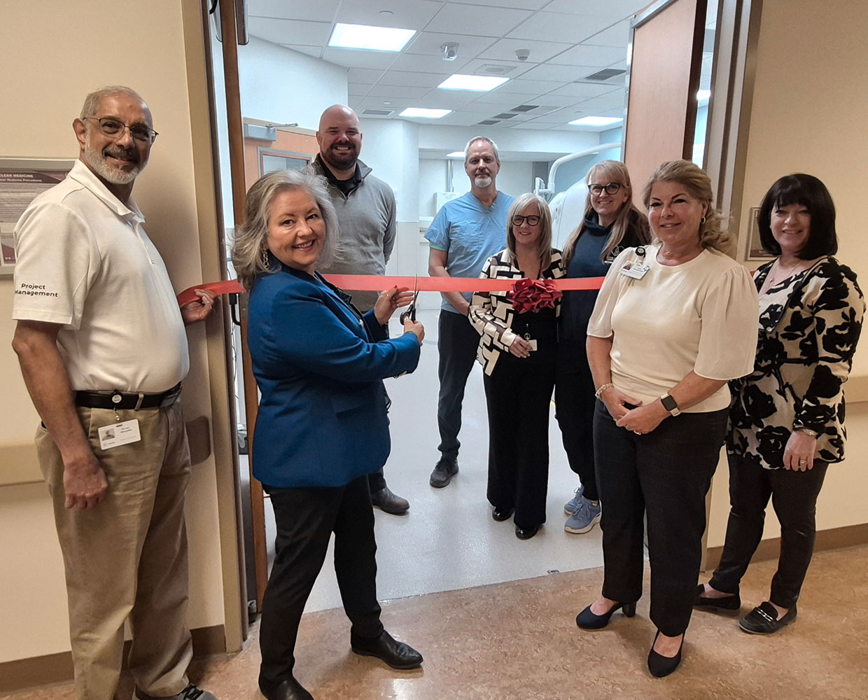 Shown above: (from left to right) Roven Misquitta, (Project Manager), Susan Walsh, (President and CEO, NHH), Ken Graham, (Manager, Diagnostic Imaging), Andrew Rennicks (Charge Technologist, Nuclear Medicine), Pam Robinson (Program Director) Alison Slack (Technologist, Nuclear Medicine), Kate Zimmerman, (Vice President Integrated Care and Chief Nursing Executive), and Rhonda Cunningham, (CEO, NHH Foundation). NHH SPECT-CT